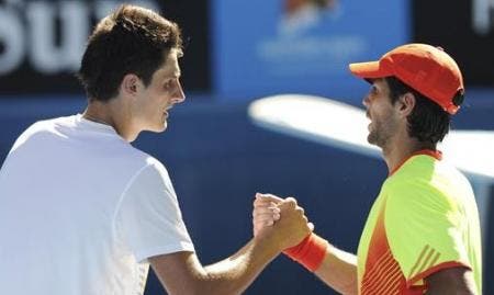 Australian Open Tennis - Bernard Tomic, left, is congratulated by Spain's Fernando Verdasco
