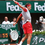 Roger Federer in azione al Roland Garros 2014 (foto by IKE LEUS)