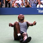Serena Williams a terra dopo aver vinto il 18° Slam, US Open 2014 (foto ART SEITZ)